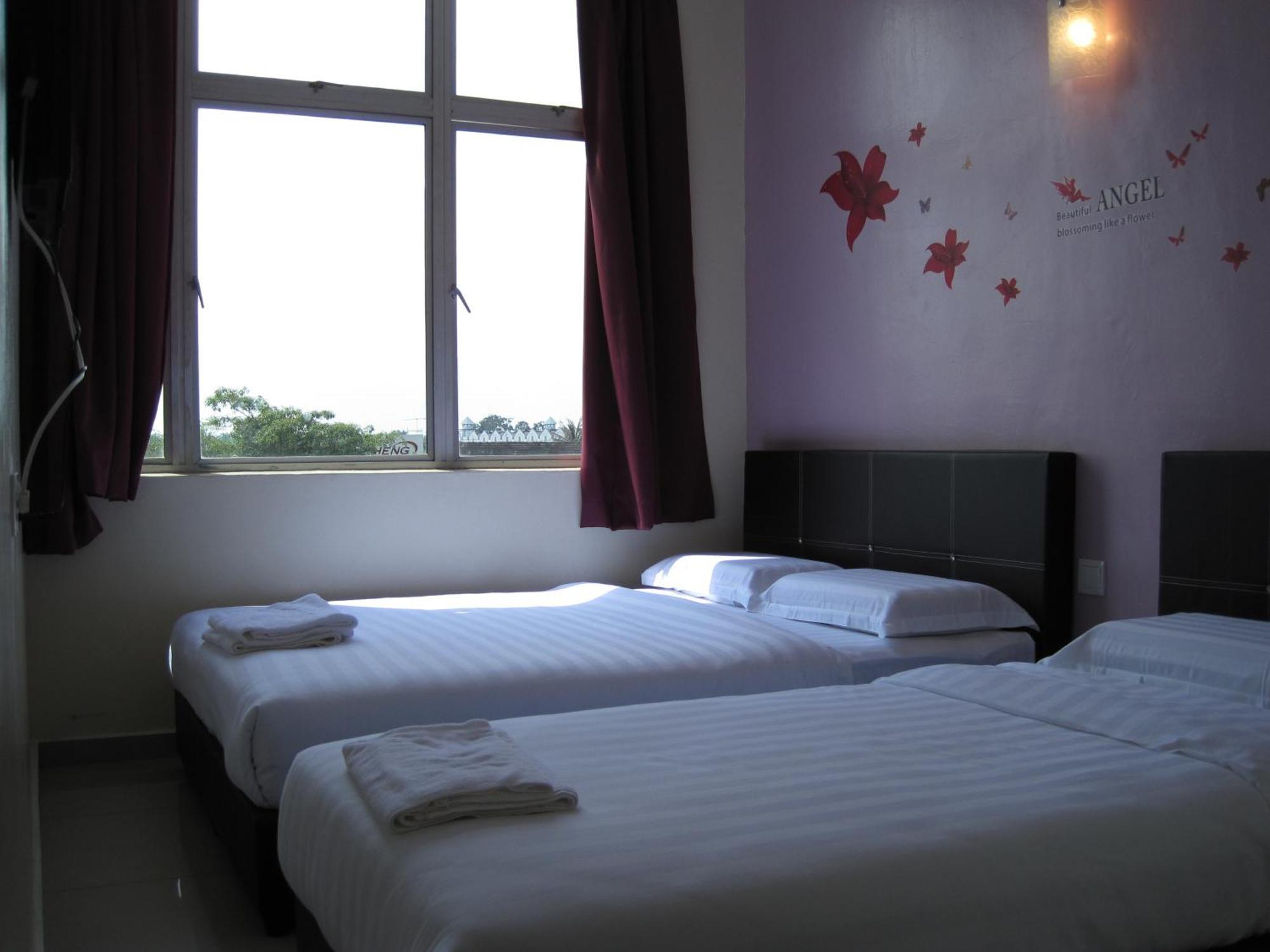 Max Inn Hotel ปาริตราจา ห้อง รูปภาพ